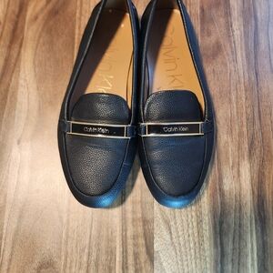Calvin Klein Black Leather Loafers with Gold Accent